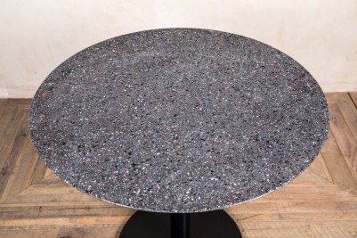 dark terrazzo round table